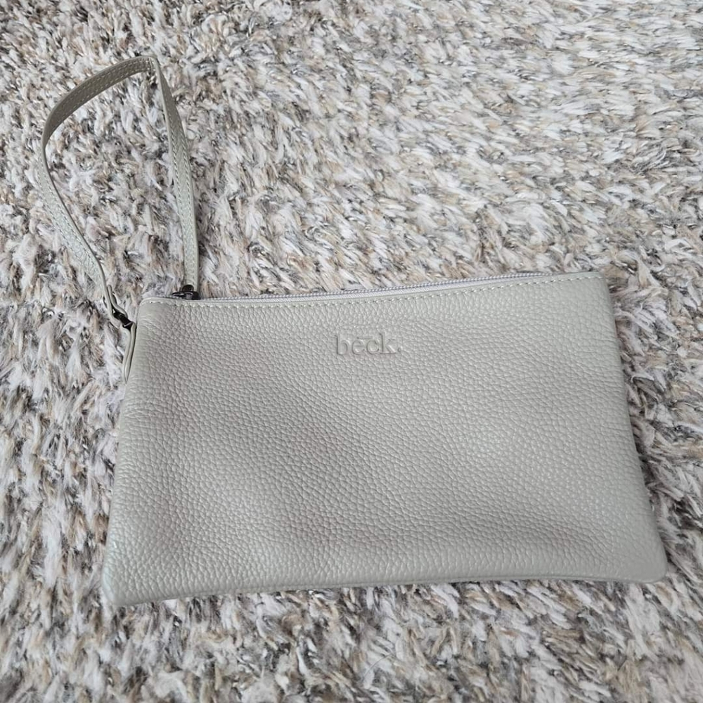 Brand new Beck wristlet.  Mushroom color